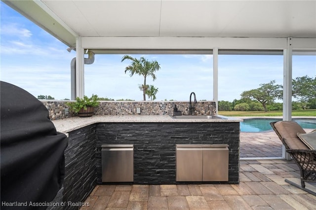 509 Bear Rd, Lake Placid, FL 33852 - view of patio / terrace with a sink, an outdoor pool, and a grill