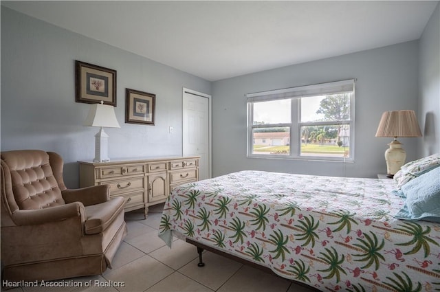 400 Spring Blvd, Sebring, FL 33876 - bedroom with light tile patterned flooring and a closet