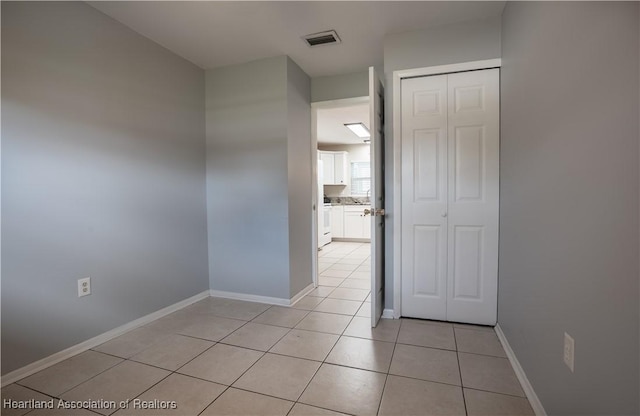 400 Spring Blvd, Sebring, FL 33876 - spare room featuring light tile patterned flooring and baseboards