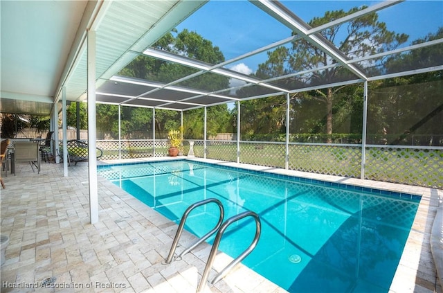 400 Spring Blvd, Sebring, FL 33876 - view of pool featuring a patio area, a lanai, and a fenced backyard
