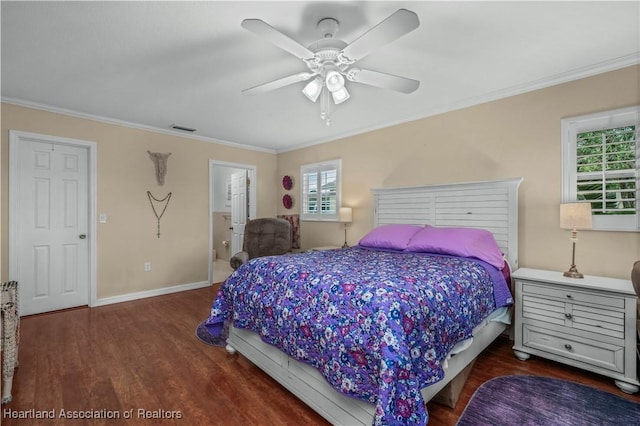 bedroom with multiple windows, ornamental molding, dark wood-type flooring, and ceiling fan