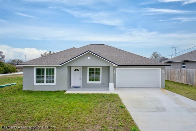 ranch-style home featuring a front yard and a garage