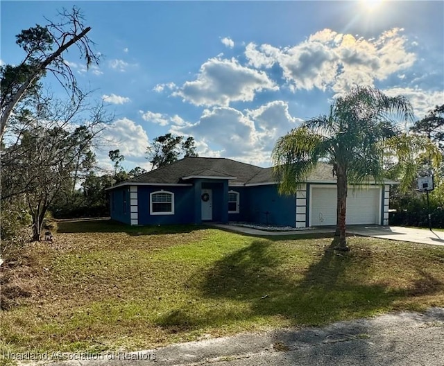 ranch-style home with a garage and a front lawn