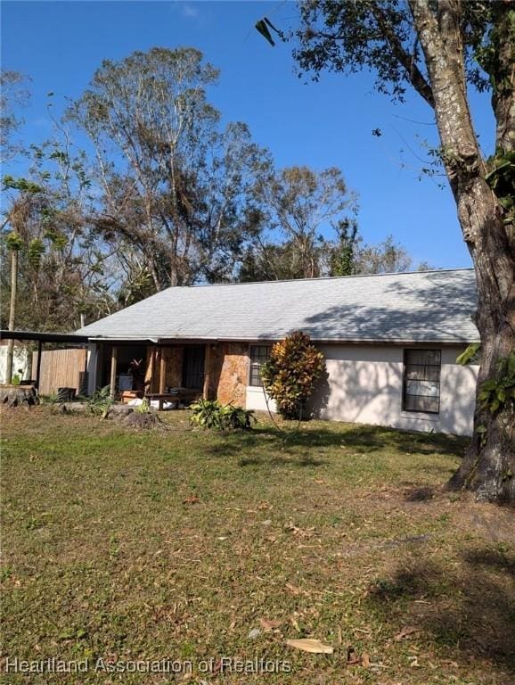 exterior space with a front yard