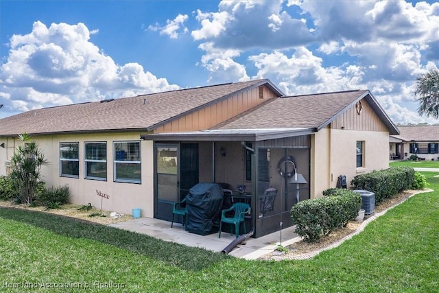 ranch-style home featuring a front lawn, stone siding, concrete driveway, a garage, and stucco siding