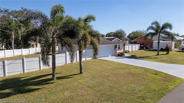 view of front facade featuring a front yard and a garage