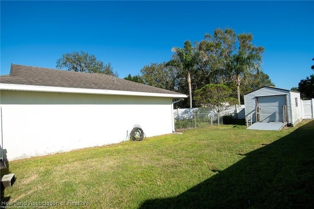 view of yard with a storage unit