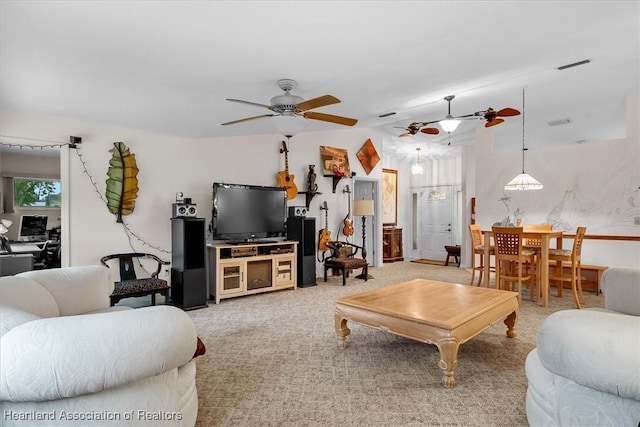 living room featuring ceiling fan