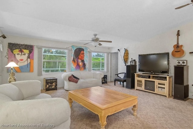 carpeted living room featuring ceiling fan