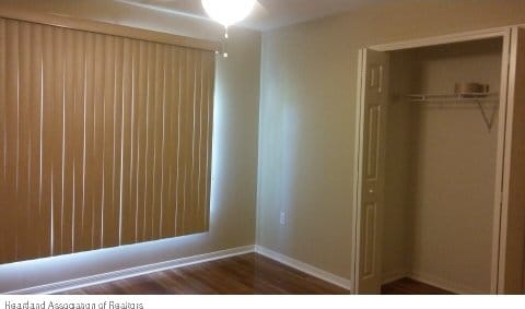 unfurnished bedroom featuring a closet