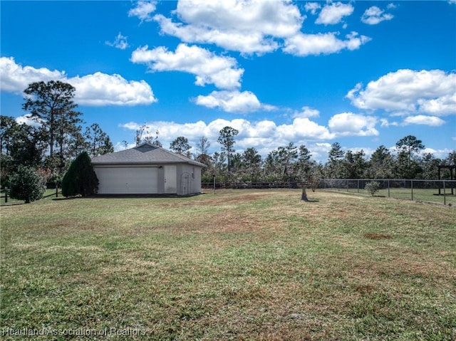 view of yard with a garage