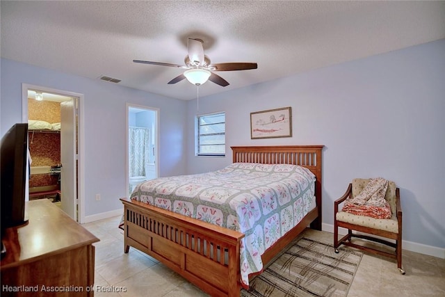 bedroom featuring baseboards, visible vents, ceiling fan, and a textured ceiling