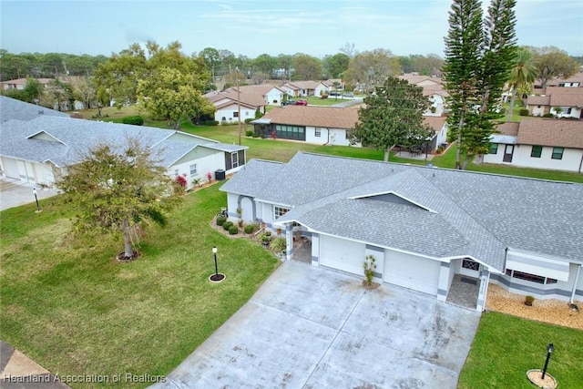 drone / aerial view featuring a residential view