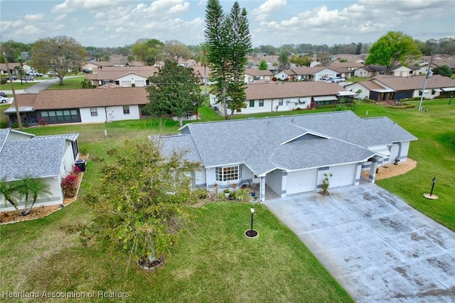 drone / aerial view with a residential view