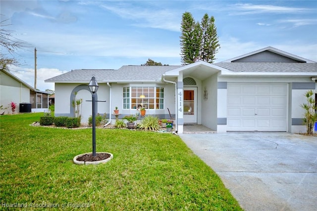 single story home featuring a garage, driveway, cooling unit, a front yard, and stucco siding