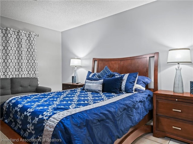 bedroom featuring a textured ceiling