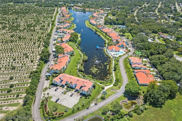 bird's eye view with a water view