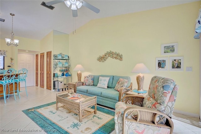 living room featuring light tile patterned floors, ceiling fan with notable chandelier, and lofted ceiling