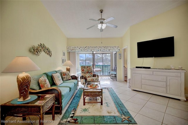 tiled living room featuring ceiling fan