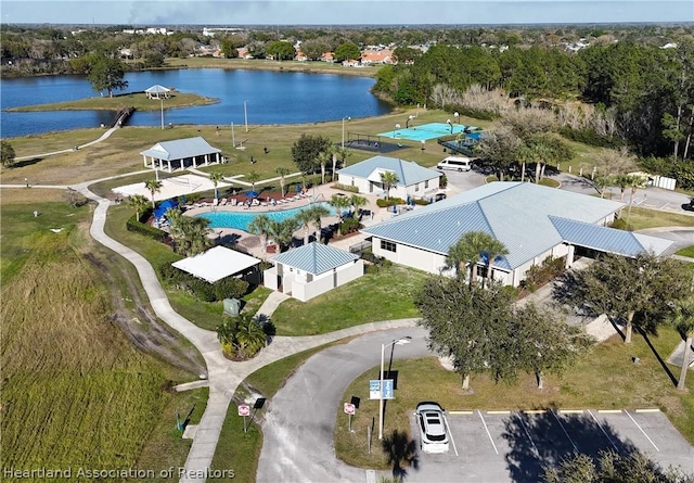 drone / aerial view with a water view