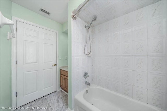 bathroom featuring vanity, visible vents, and shower / bathtub combination