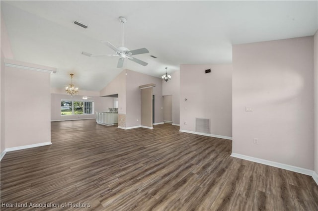 unfurnished living room with ceiling fan with notable chandelier, visible vents, baseboards, and wood finished floors