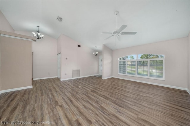 unfurnished living room with baseboards, visible vents, wood finished floors, and ceiling fan with notable chandelier