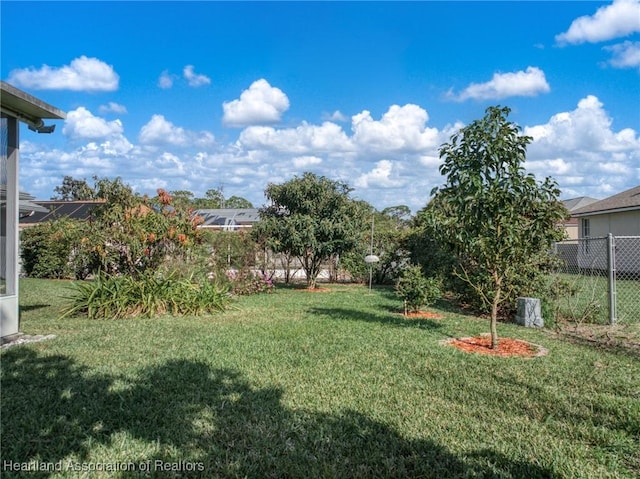 view of yard featuring fence