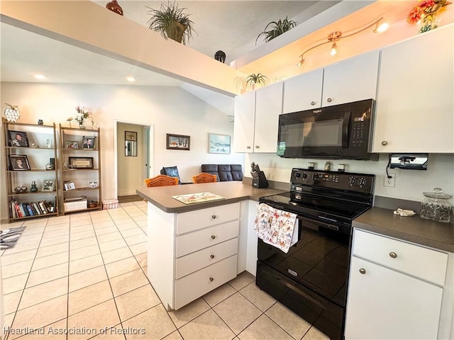 3216 Locust Ave, Lake Placid, FL 33852 - kitchen with black appliances, a peninsula, light tile patterned flooring, dark countertops, and white cabinetry