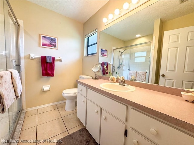 3216 Locust Ave, Lake Placid, FL 33852 - full bathroom with vanity, a stall shower, a textured ceiling, and tile patterned floors