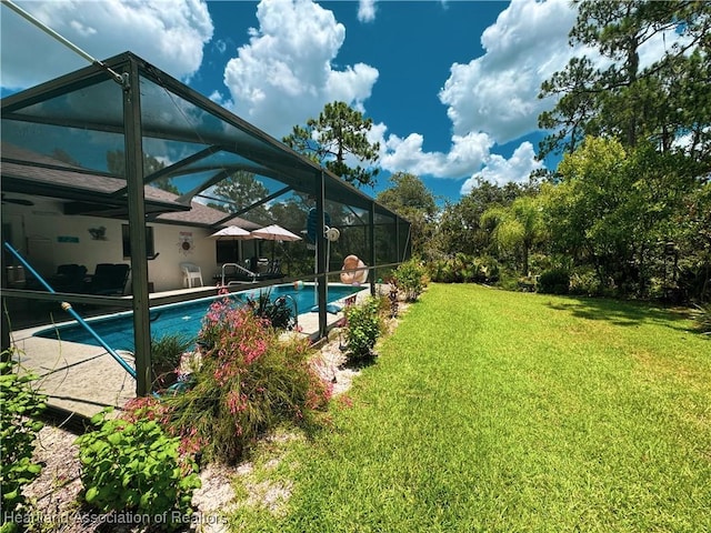 3216 Locust Ave, Lake Placid, FL 33852 - outdoor pool featuring a lawn, a lanai, and a patio area