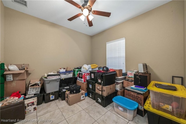 storage area featuring ceiling fan