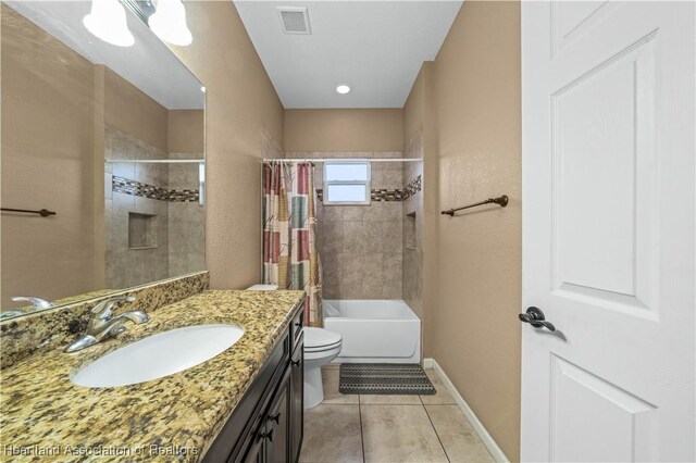 full bathroom with tile patterned floors, vanity, shower / bath combination with curtain, and toilet