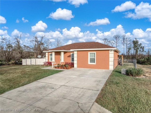 ranch-style house with a front yard