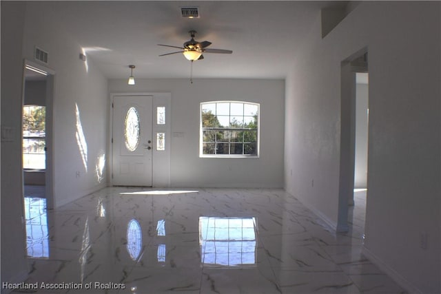 foyer with ceiling fan