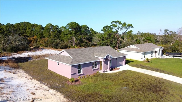 view of front of home with a front yard