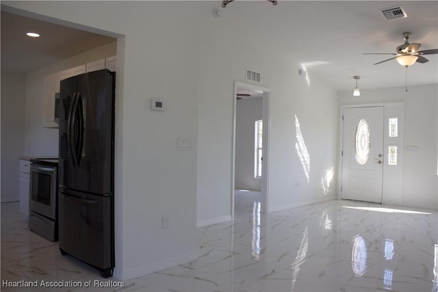 foyer with ceiling fan