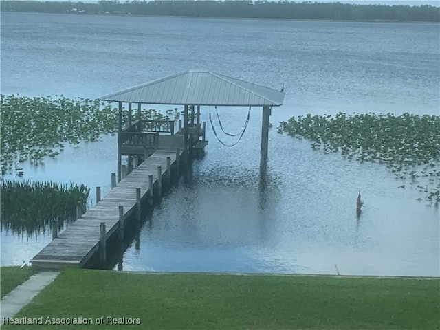 dock area featuring a water view