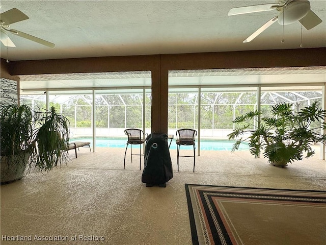 5717 Longbow Dr, Sebring, FL 33876 - sunroom / solarium with ceiling fan and a pool