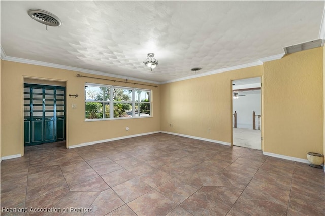 tiled empty room with ornamental molding