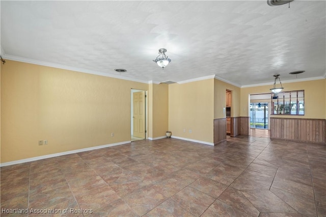 spare room with ornamental molding