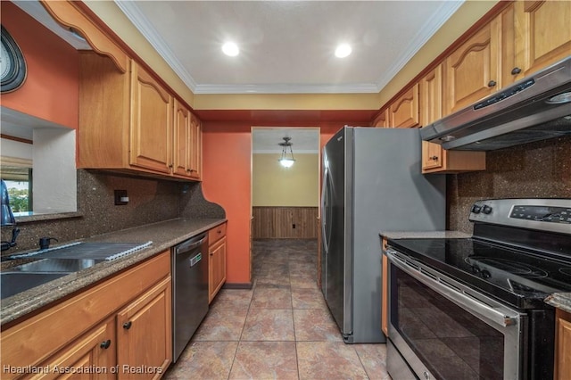 kitchen with sink, appliances with stainless steel finishes, dark stone counters, light tile patterned floors, and ornamental molding