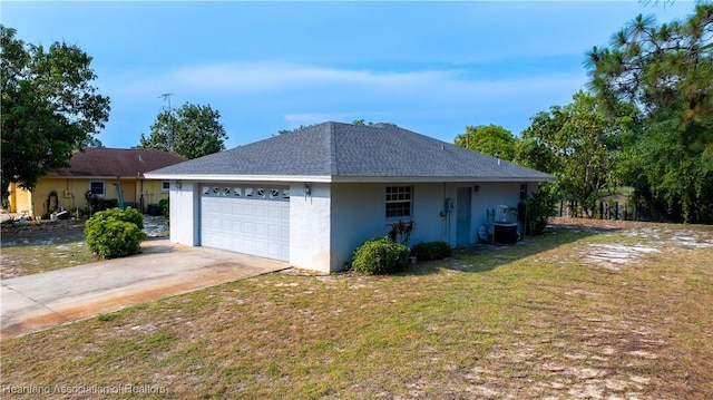671 Lake Tina Dr, Lake Placid, FL 33852 - view of side of property featuring stucco siding, a yard, an attached garage, and concrete driveway