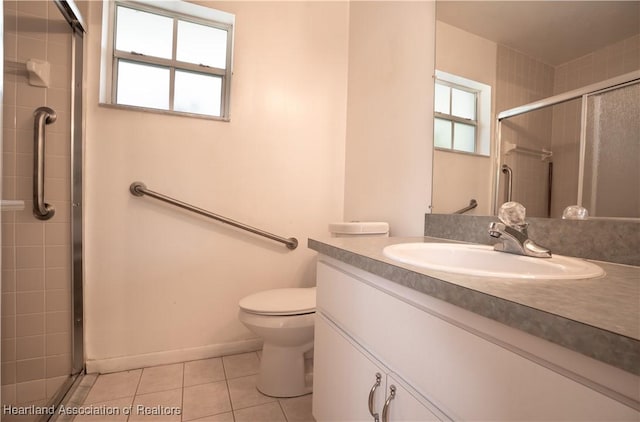 671 Lake Tina Dr, Lake Placid, FL 33852 - bathroom featuring a stall shower, tile patterned flooring, vanity, and toilet