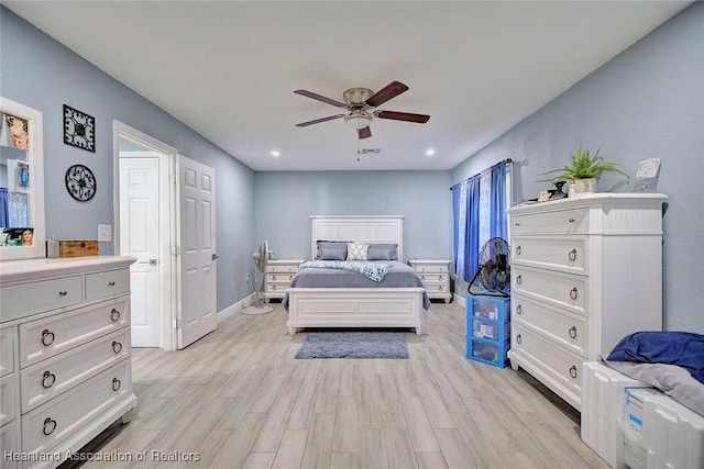 bedroom featuring ceiling fan and light hardwood / wood-style flooring