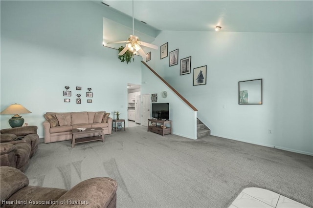 living room with light carpet, high vaulted ceiling, and ceiling fan