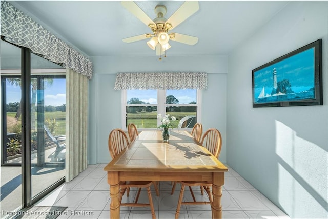 dining room with ceiling fan