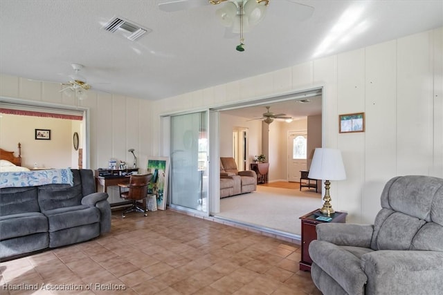 living room with a textured ceiling