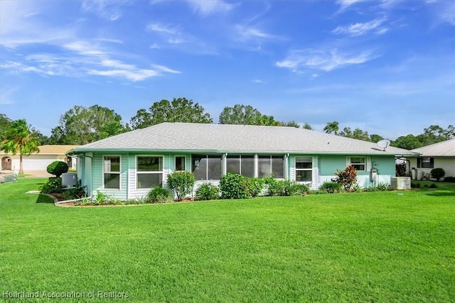 view of front of home with a front lawn