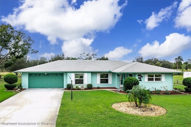 single story home featuring a front yard and a garage